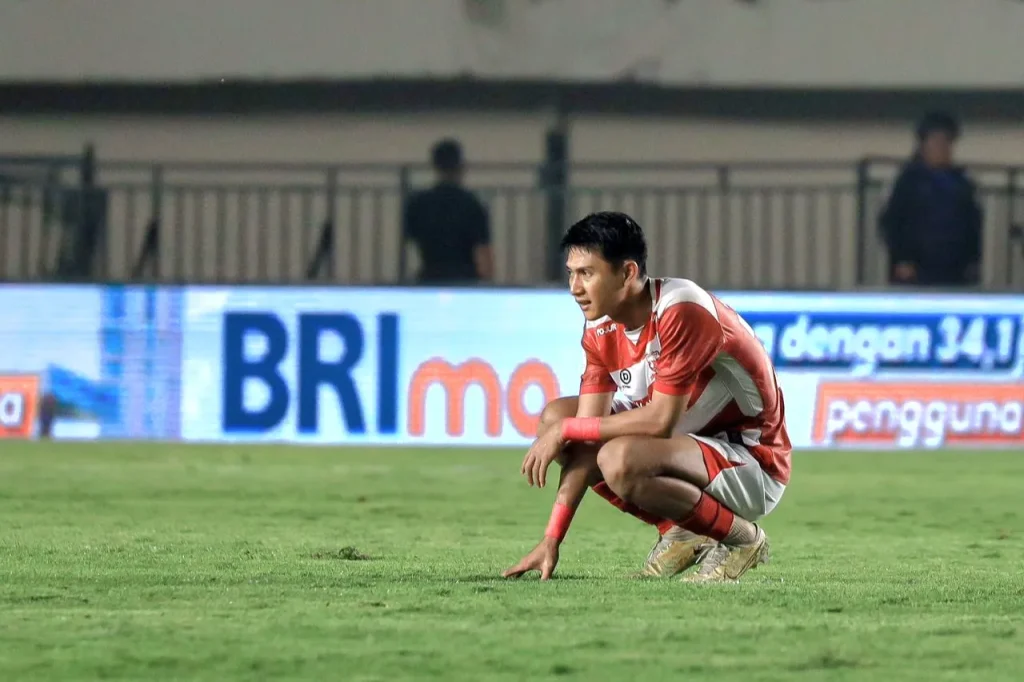 Bursa Transfer Liga 1 : Madura United Bedol Desa, Rombak Total Pemain Asing Foto : Malik Risaldi merenungi kekalahan Madura United di Liga 1 (c)mediamaduraunited